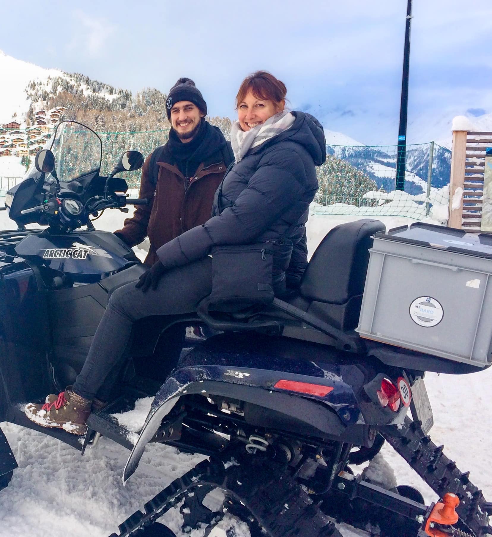 Lady-on-a-snowmobile-in-the-mountains