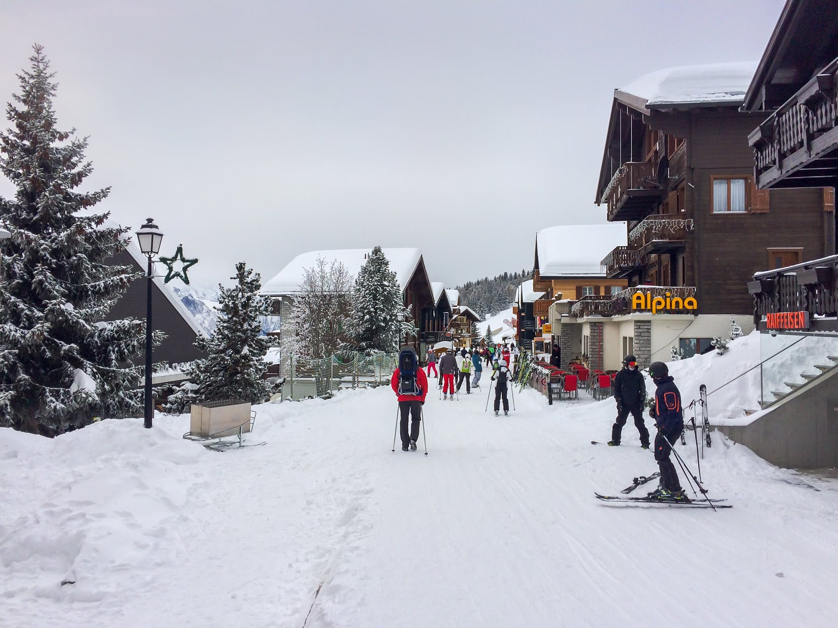 People skiing on the main road through Bettmeralp 