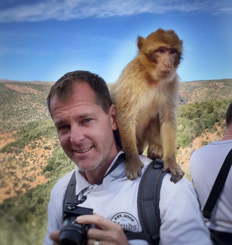 monkey on Lars shouder near Ouzoud Falls Morocco