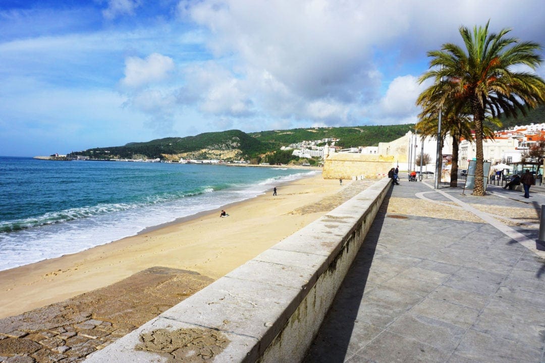 Sesimbra beach beside long promenade