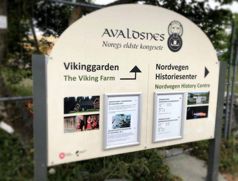 Sign at the homeland of the viking kings showing the way to the history centre and the viking farm