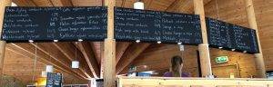 the menu on a large blackboard above the counter at the restaurant at kjerag