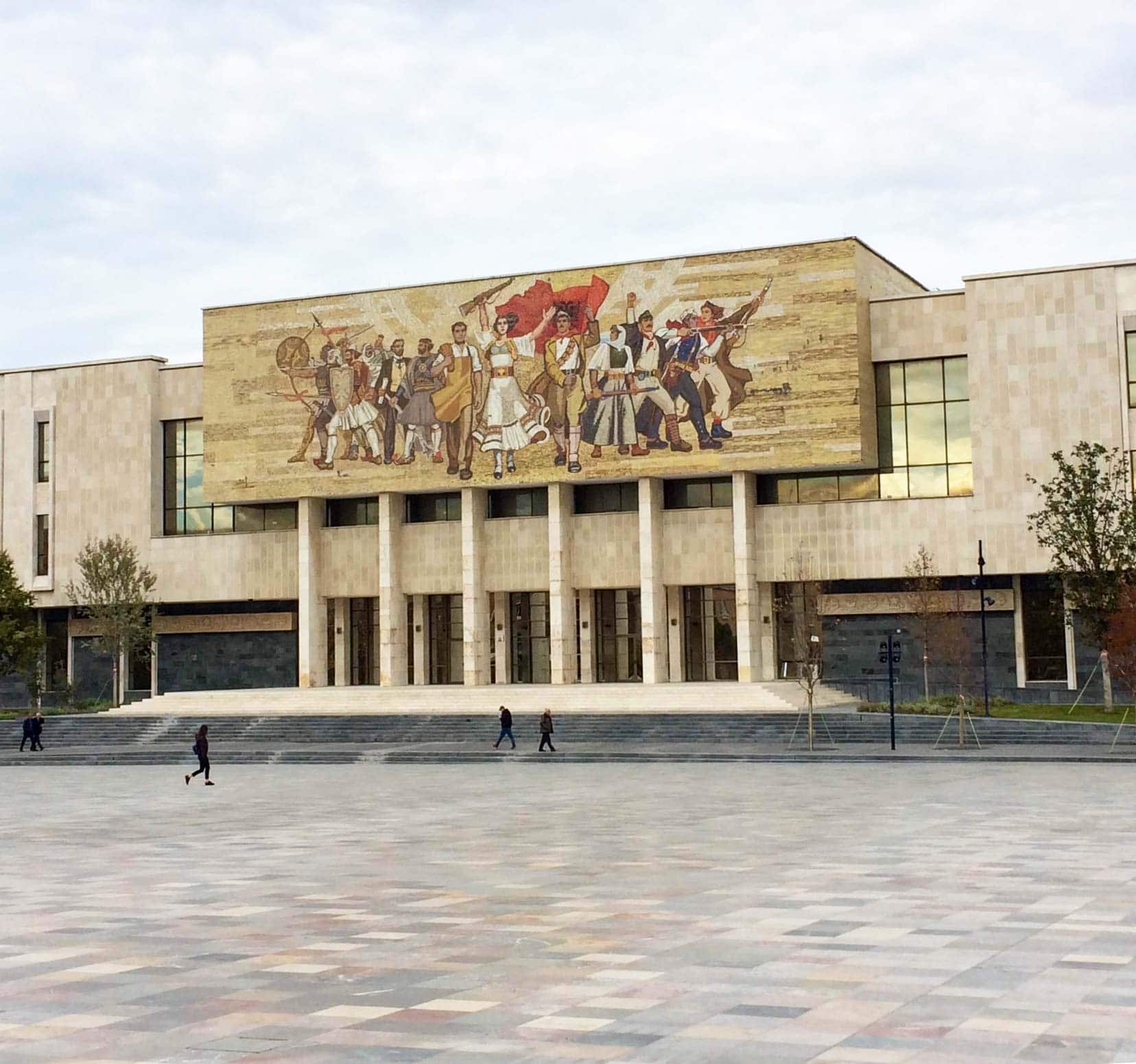 Campervanning-in-Albania-National History Museum facade with depiction of communist fighters on the outside 