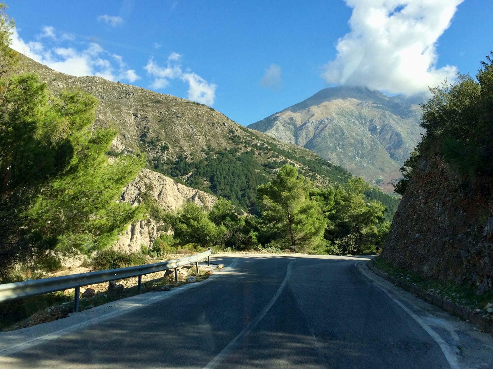 Campervanning-in-Albania-Scenery mountains on either side of the road and ahead