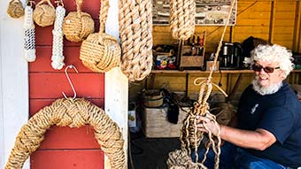 Local rope maker at his stall at the Skudeneshavn Tall Ships Festival