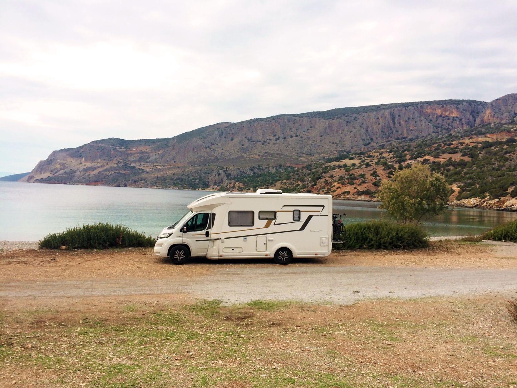 Motorhome parked on the beach in Greece