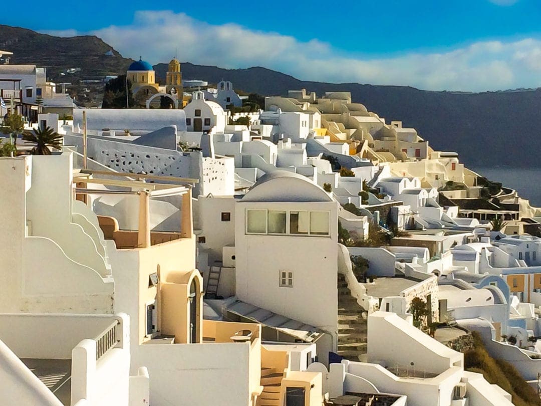 Oia, Santorini town built on a hill overlooking the sea