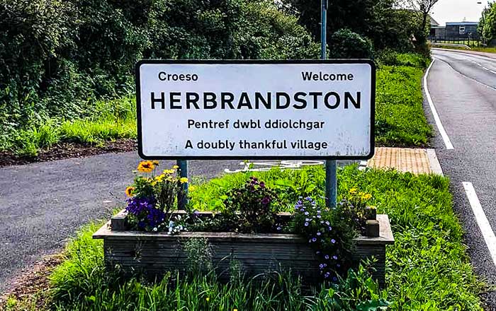 SIgn for the town of Herbrandstone in Pembrokeshire, Wales .