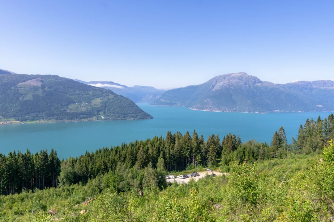 Car park view down the mountain side with fjord background