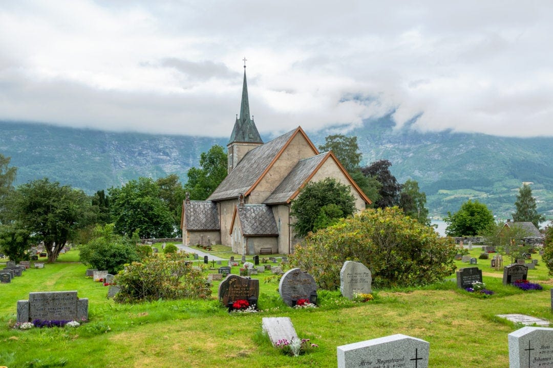 church with mountain backdrop