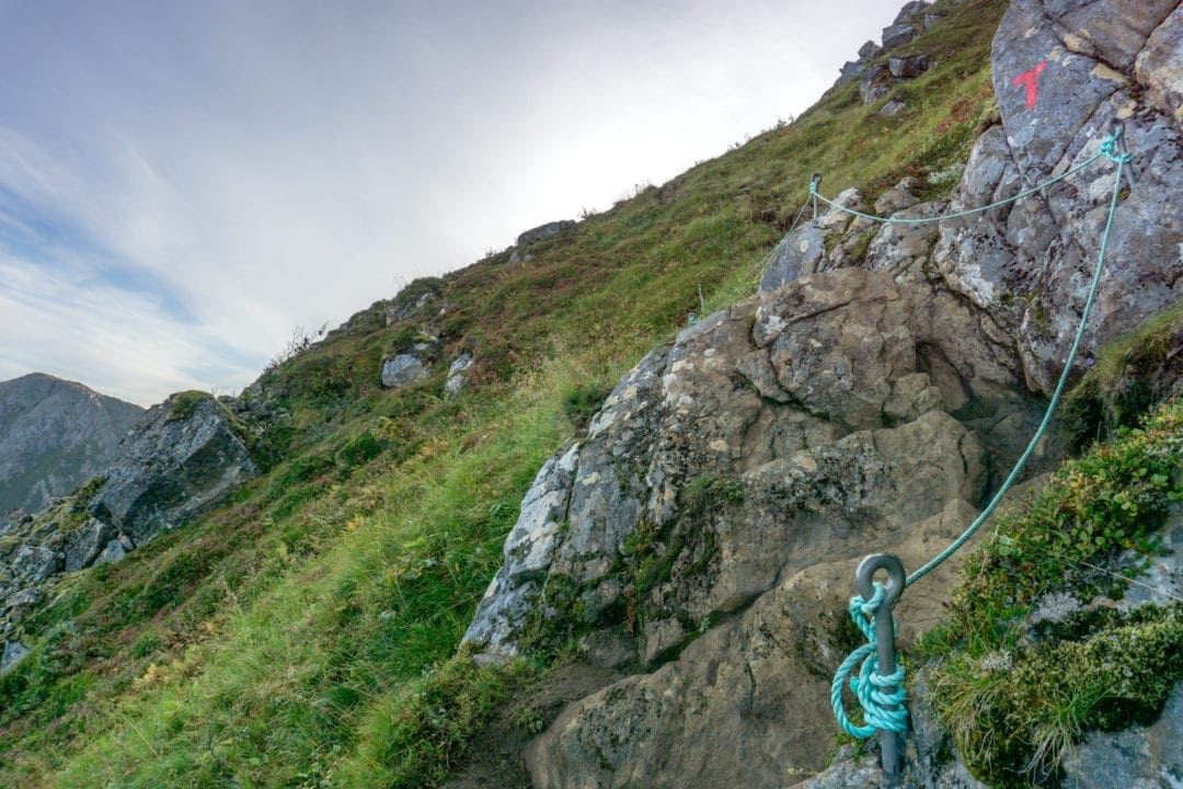 ope hand rails up a rocky mountain path