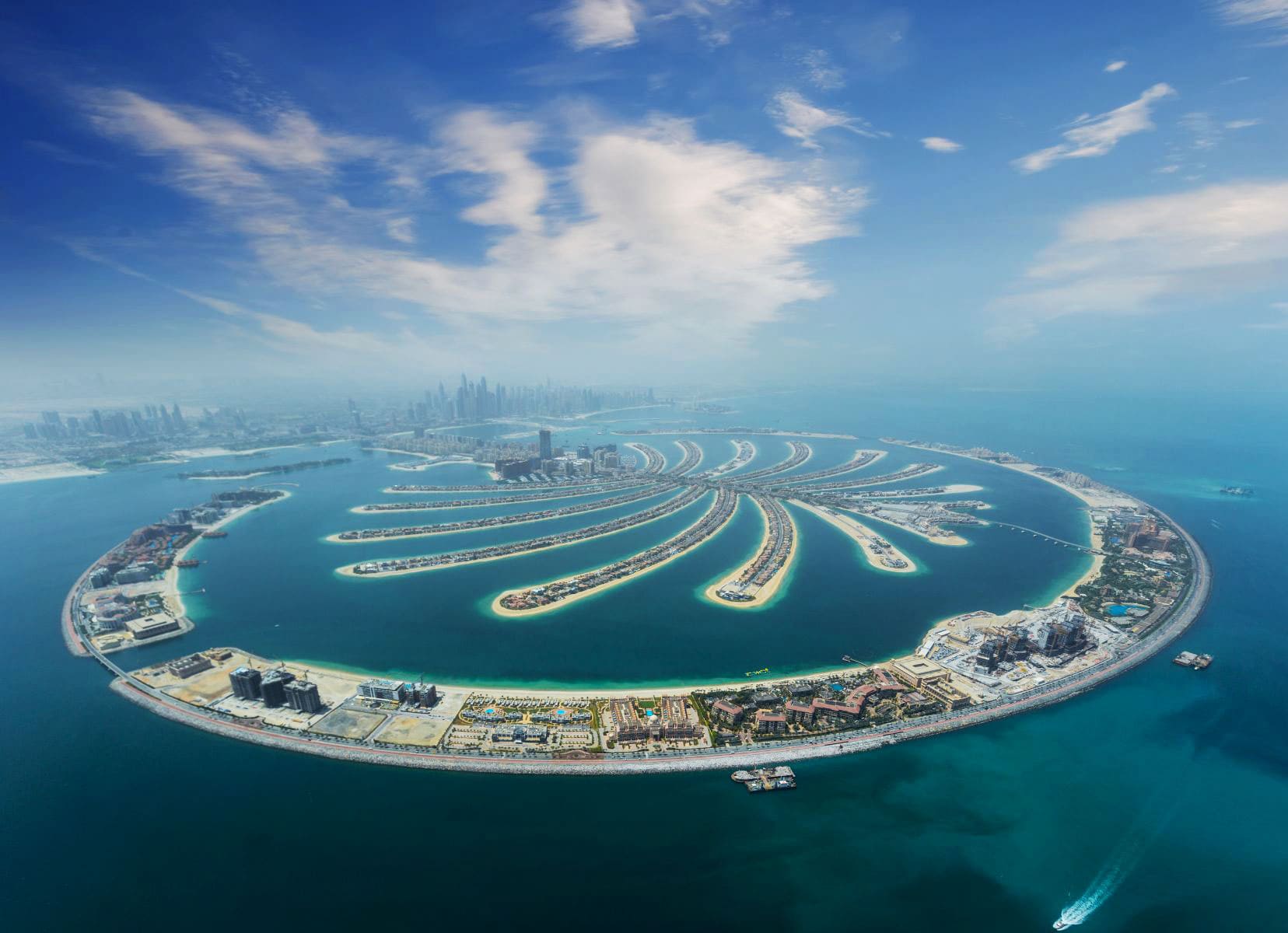 one day in dubai suggestion to visit Pam Jumeirah - a hotel in the shape of a palm tree from above 