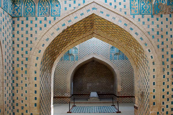 Mausoleum interior showing arches and blue tiles
