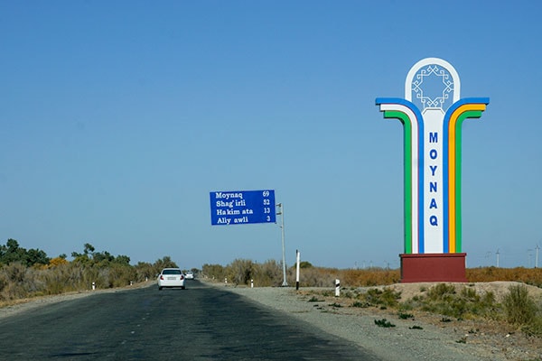 Colourful road sign on the way to Moynaq (Muynak)