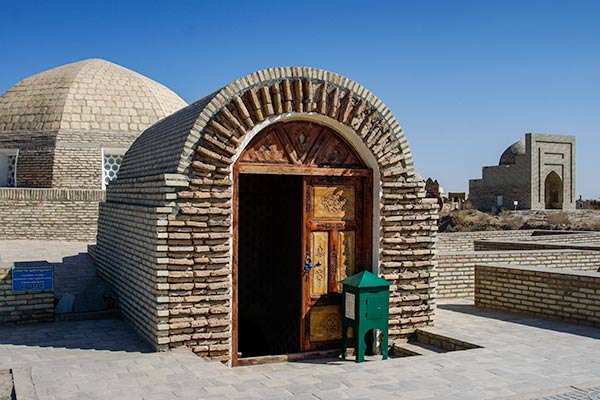 Earthen brick entrance to an underground mausoleum