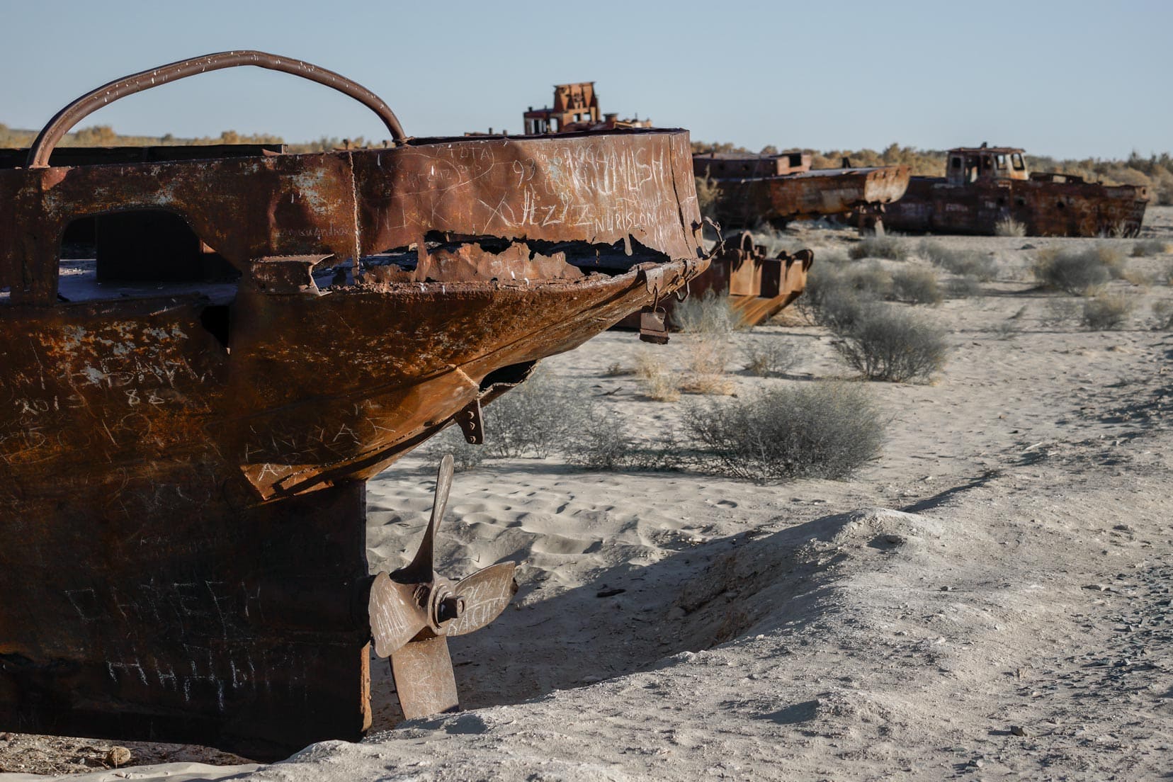 Aral sea rusting ships.