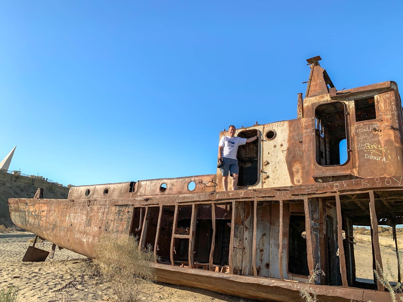 Me-at-Aral-Sea-ship-graveyard,-Muynak