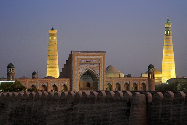 One of the must see things to do in Khiva is to view the Muhammad Rakhimkhan Madrassah from the city walls at sunset