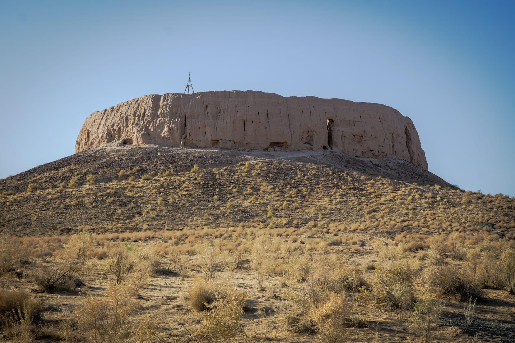 dirt-round-structure-on-a-hill