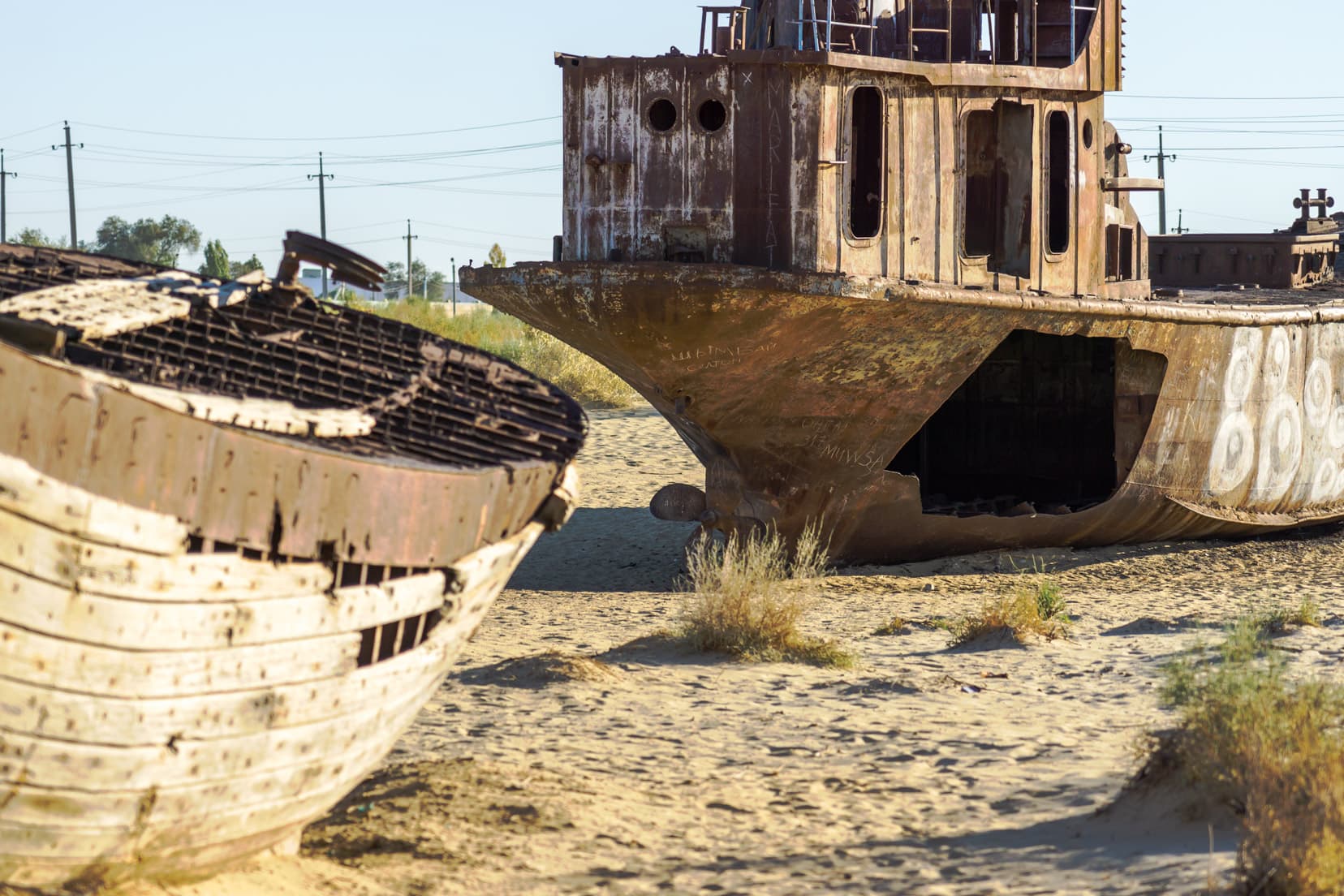 rusty-ship-hulls-on-the-sand