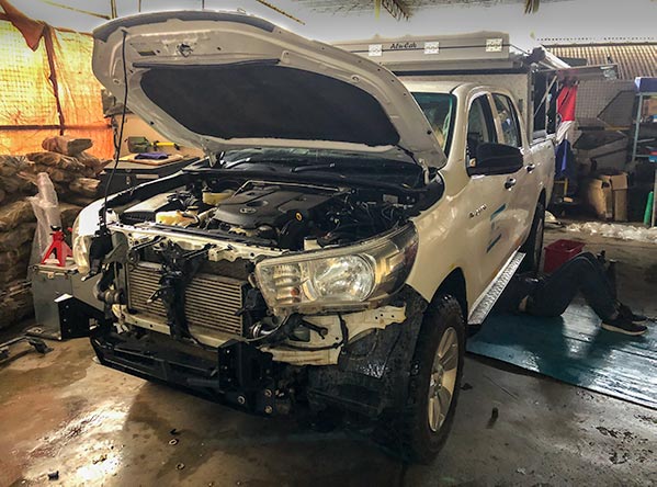 Our Toyota Hilux 4x4 rental South Africa after we bought it and now in a workshop for upgrades