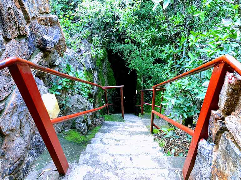 Wonder caves entrance with steep steps to the cave below at the Rhino and Lion Park johannesburg