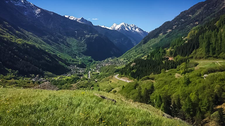 Driving to Italy from Switzerland with views of the mountains and valley