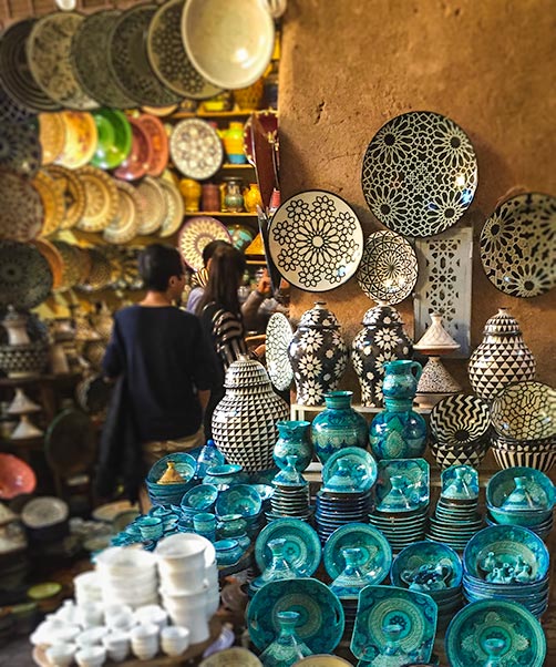 Multi-coloured pottery in a shop