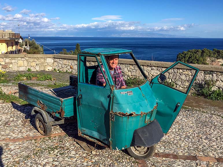 Old car like those you see a lot driving in Sicily