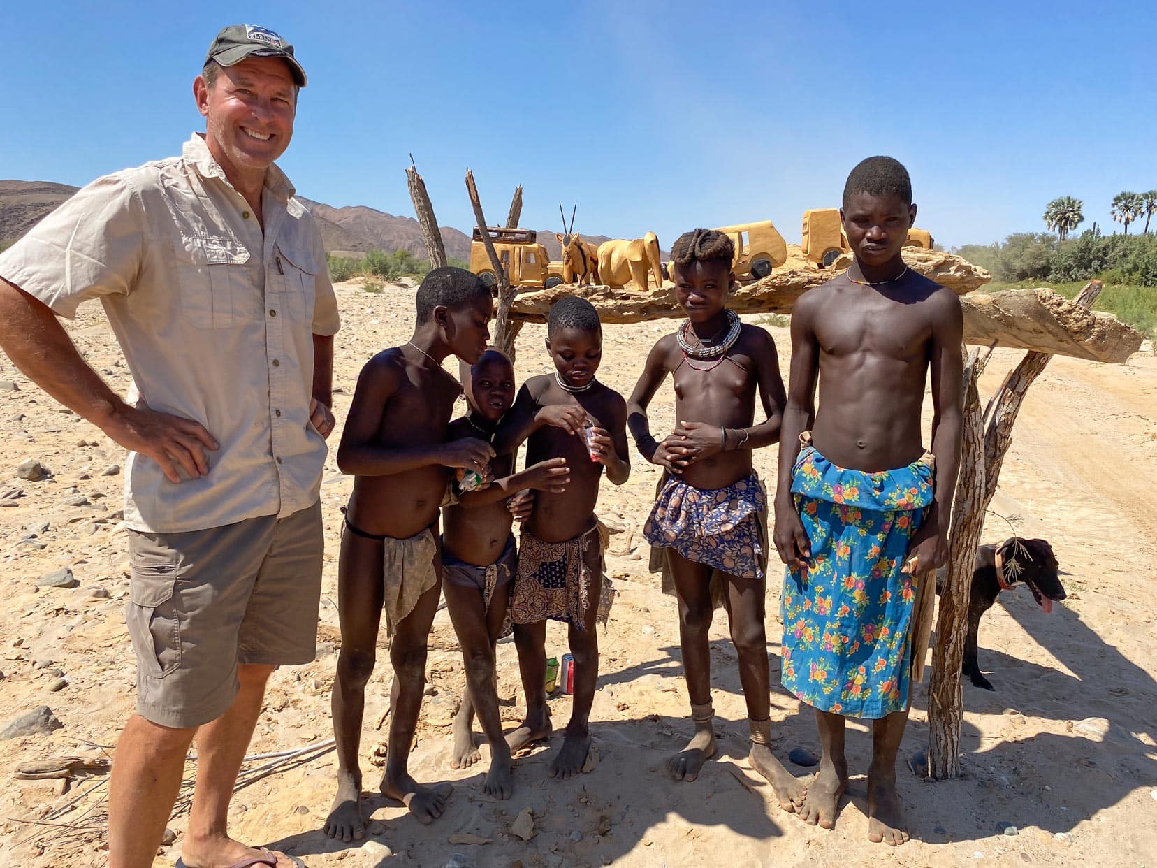 me wearing Khaki-clothes-in-africa-amongst-Himba-Children