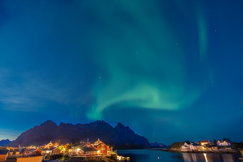 Henningsvær Northern Lights2 Green Northern Lights over a traditional Norwegian wooden housed village