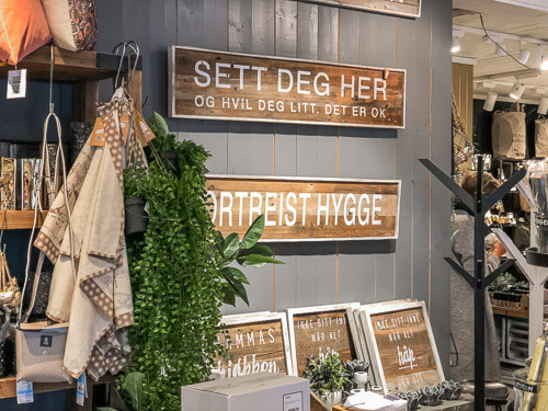 Shop interior with signs in Norwegian language 
