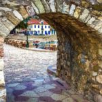 Nafpaktos harbour wall with view through to the harbour