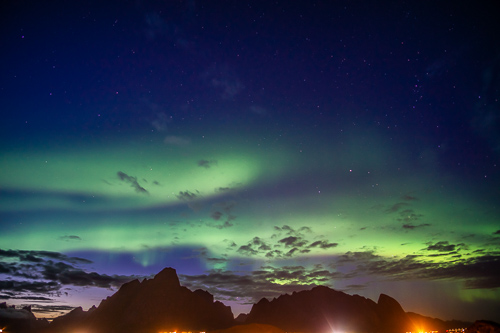 Northern Lights, Reine, Lofoten northern lights over dark mountains