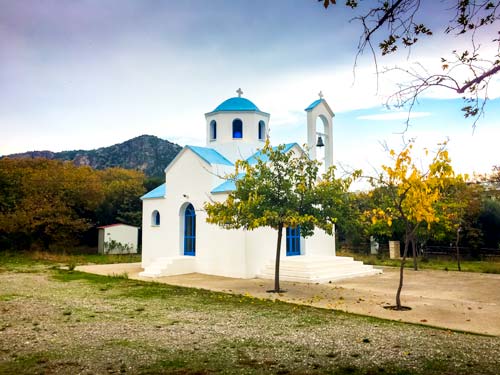 tiny blue and white chapel in Greece