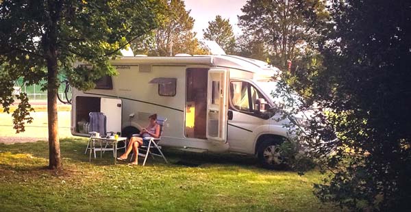 shelley sat by a motorhome