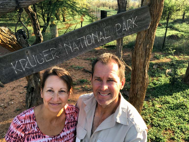 Lars and Shelley by a sign that says Kruger National Park