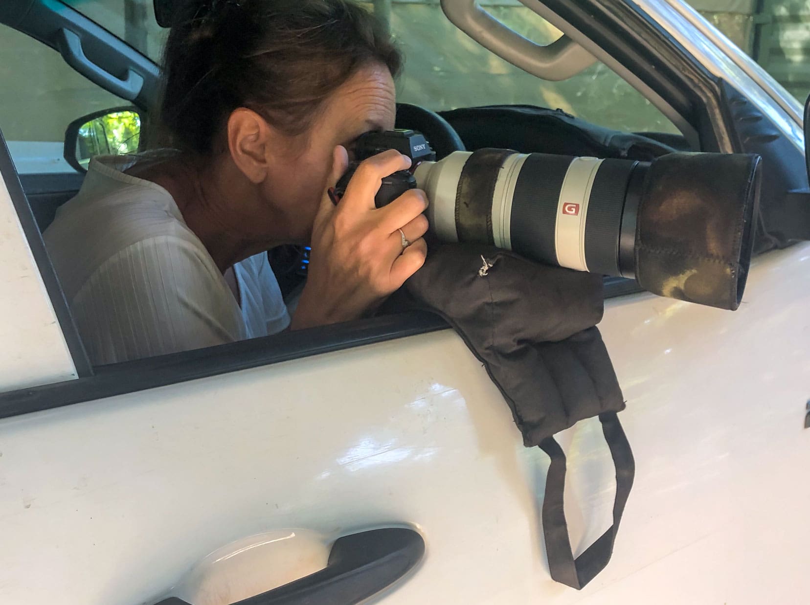 safari accessories- camera-bean-bag-on a car window still and under-the-lens