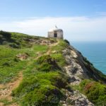 Memory-Chapel-CAbo-Espichel - white building on the edge of a cliff