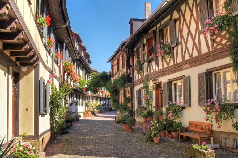 Gengenbach cobbled street with flowers and half timbered houses