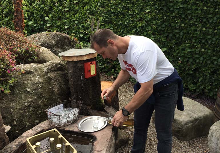 lars by a schnapps fountain in sasbachwalden