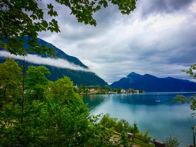 View of Walchensee Lake with trees framing the image