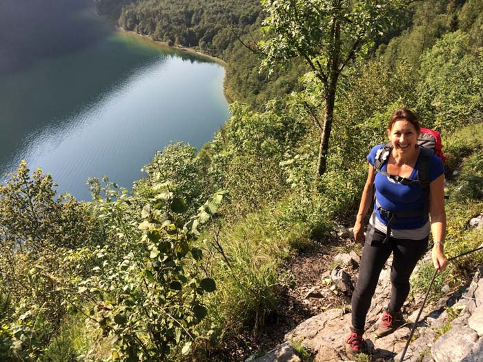 woman climbing a trail above Konigssee Lake