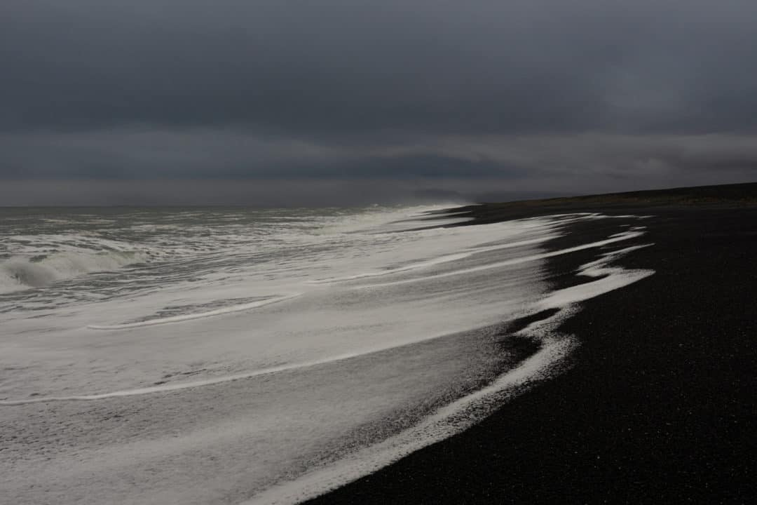 Breathtaking Icelandic landscapes__Hvalnes Beach and it's long black lava shoreline with water breaking on its surface