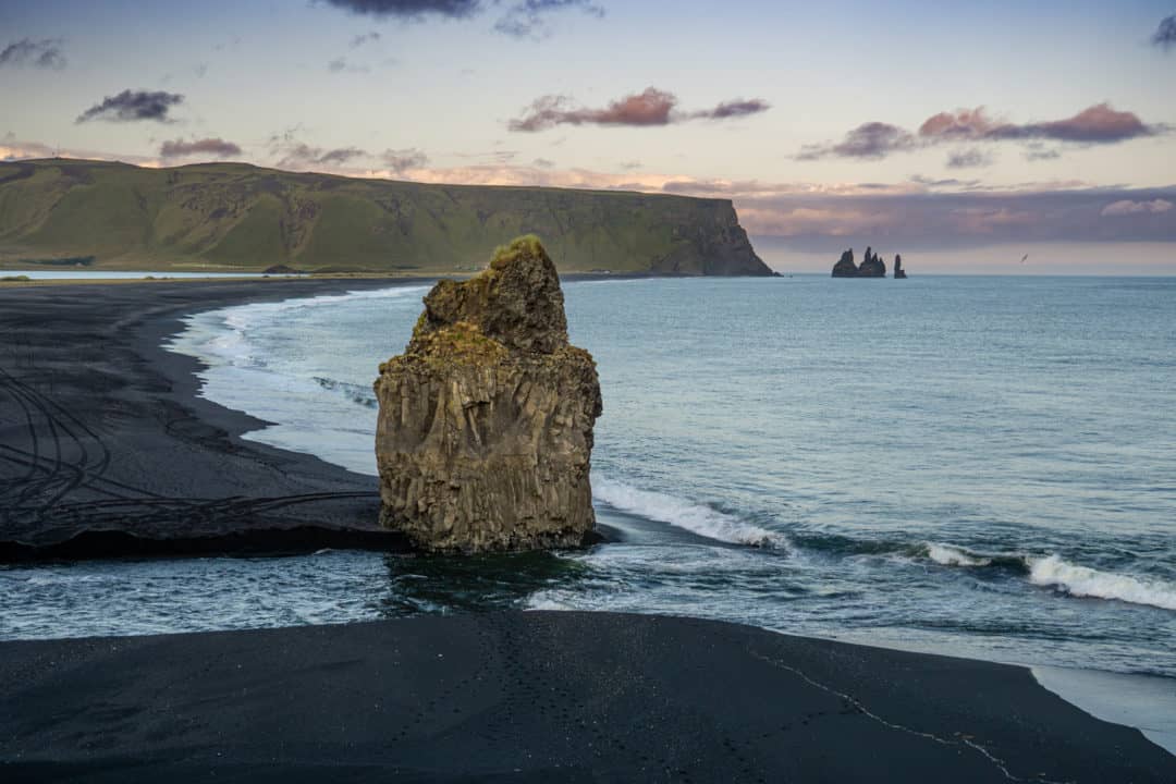 Breathtaking Icelandic landscapes__Reynisfjara Beach with the black lava sand and rock stack jutting up from the beach