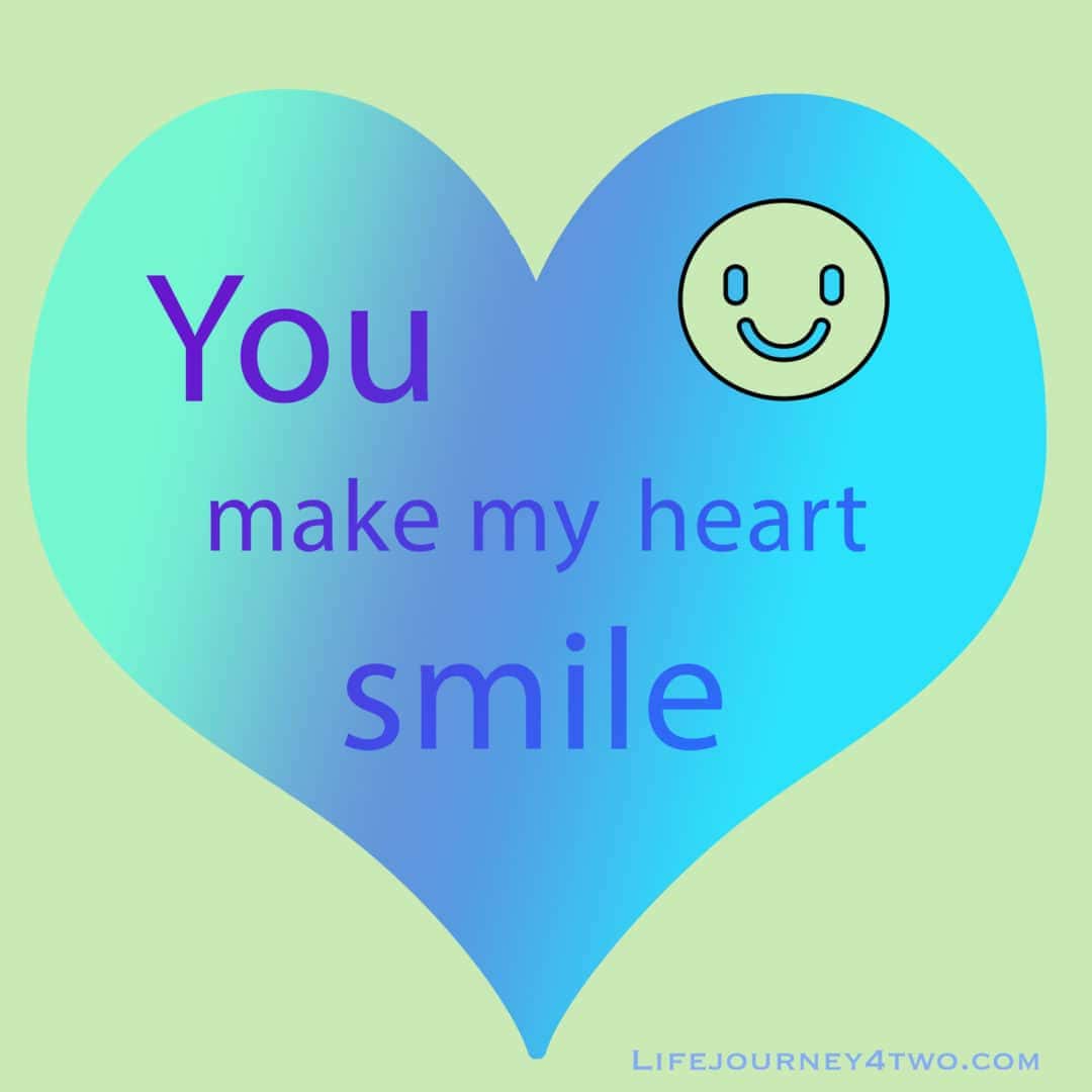 You make my heart smile caption on a blue heart 