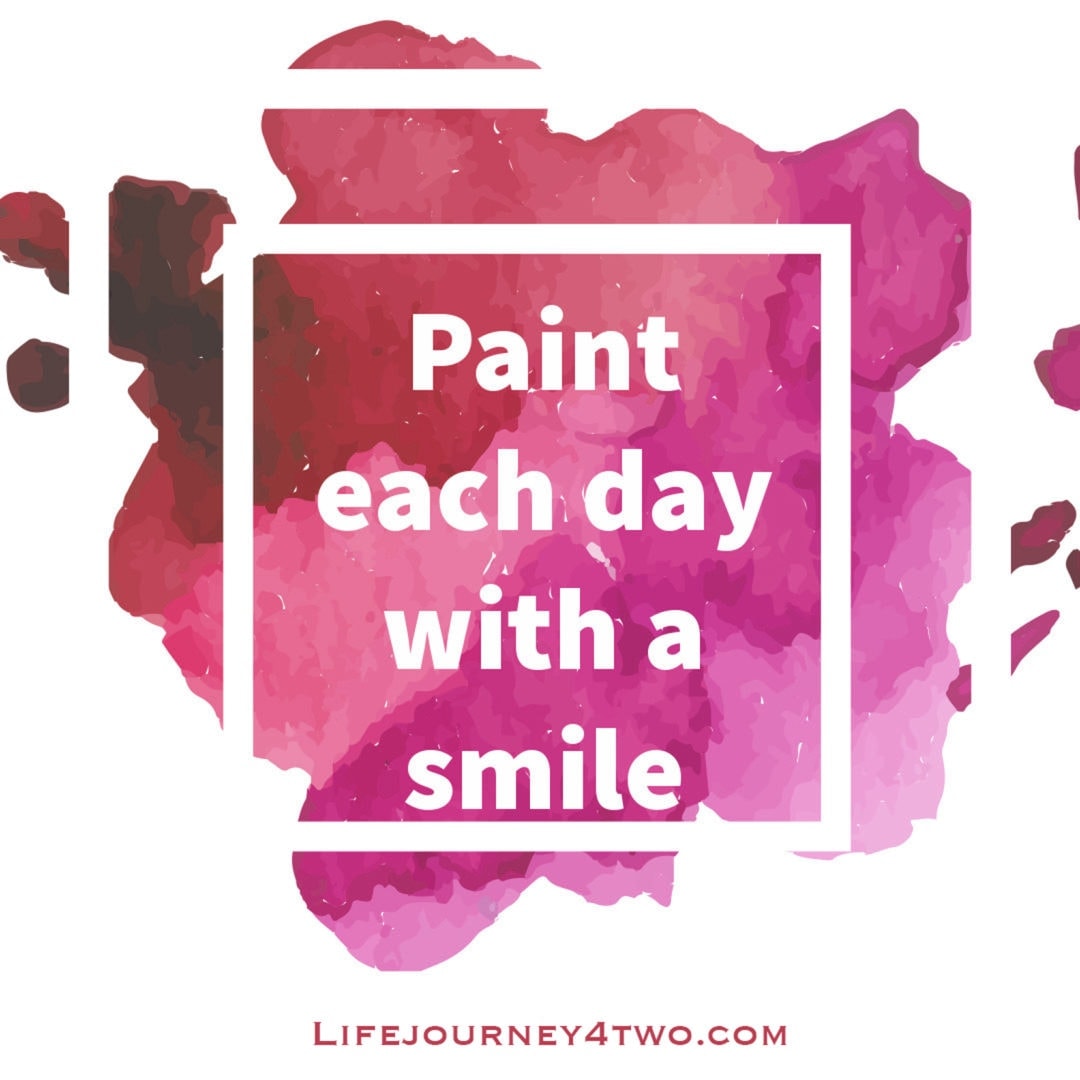 paint each day with a smile caption on a paint splodge