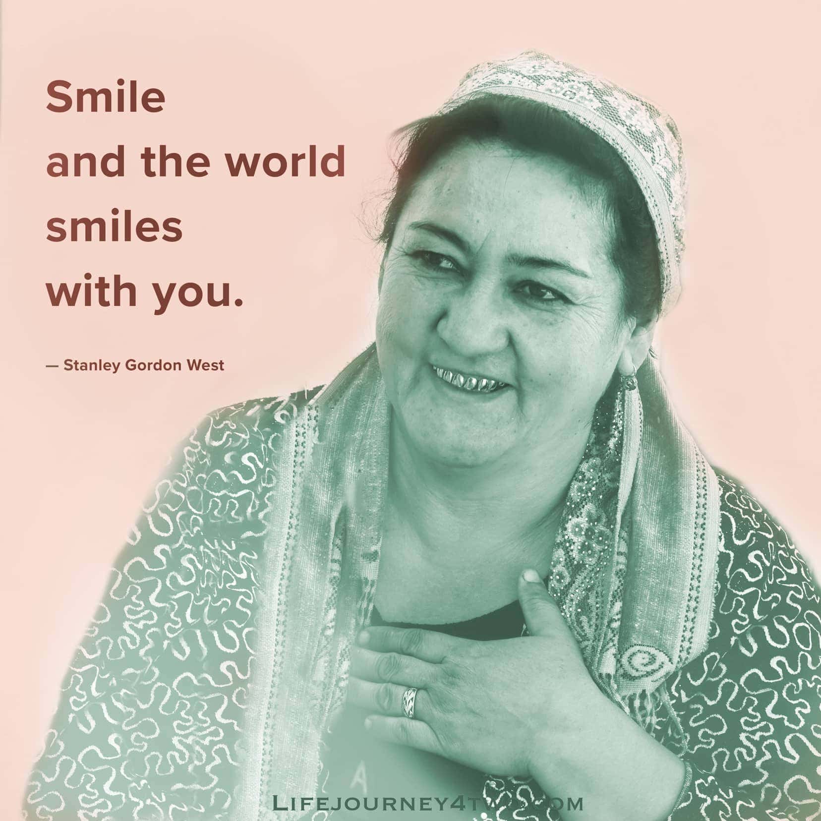 smiling quote with photo of woman smiling and touching her heart