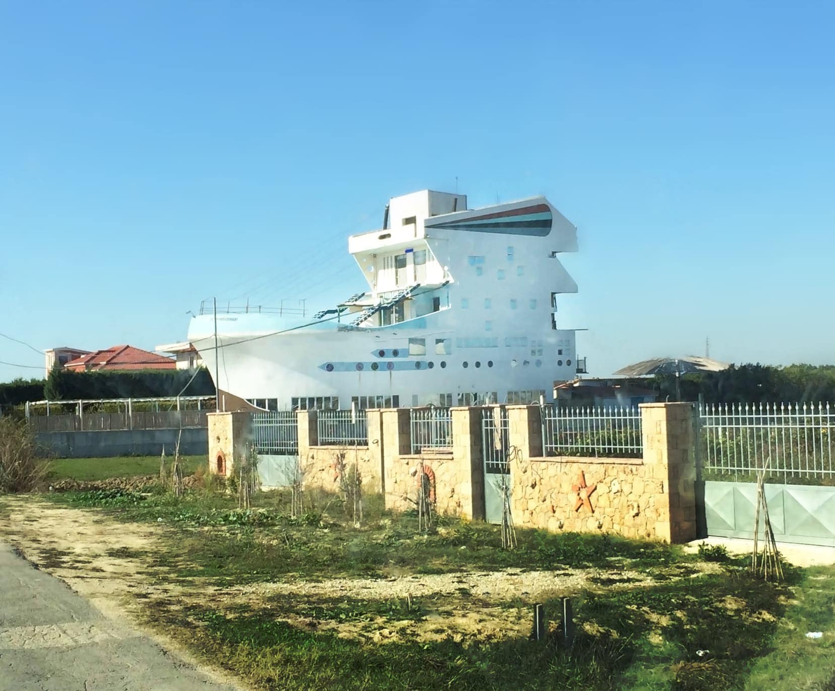 7 story house built in the shape of a ship on one of main roads in Albania