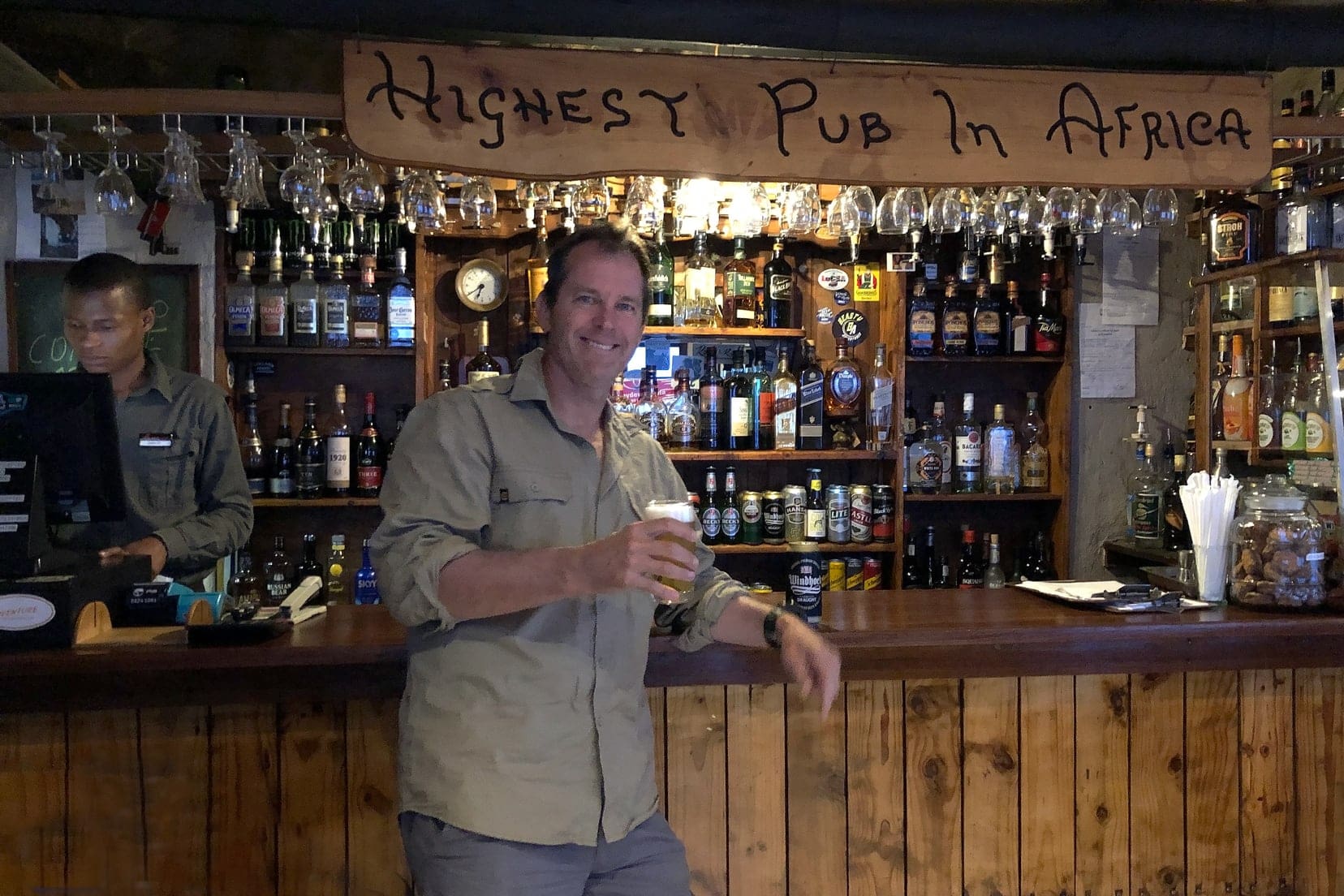 man-drinking-at-a-bar